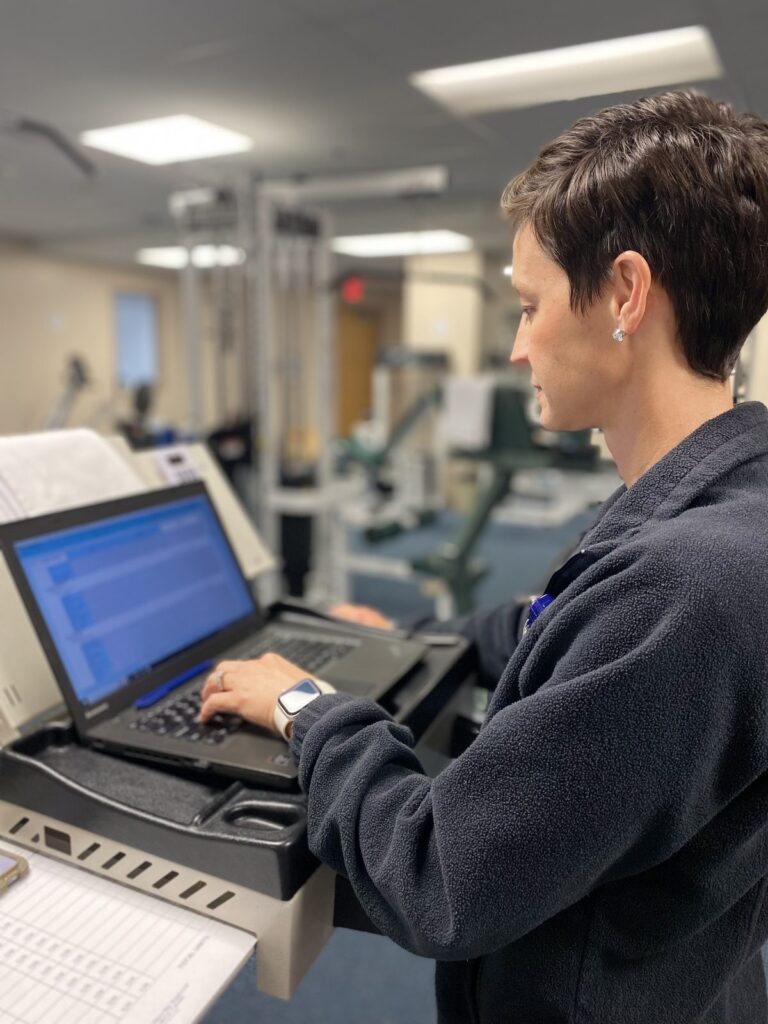 CRMC rehabilitation staff working with a patient